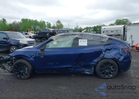 2023 Tesla Model Y from USA, damaged, VIN 7SAYGAEE9PF846733